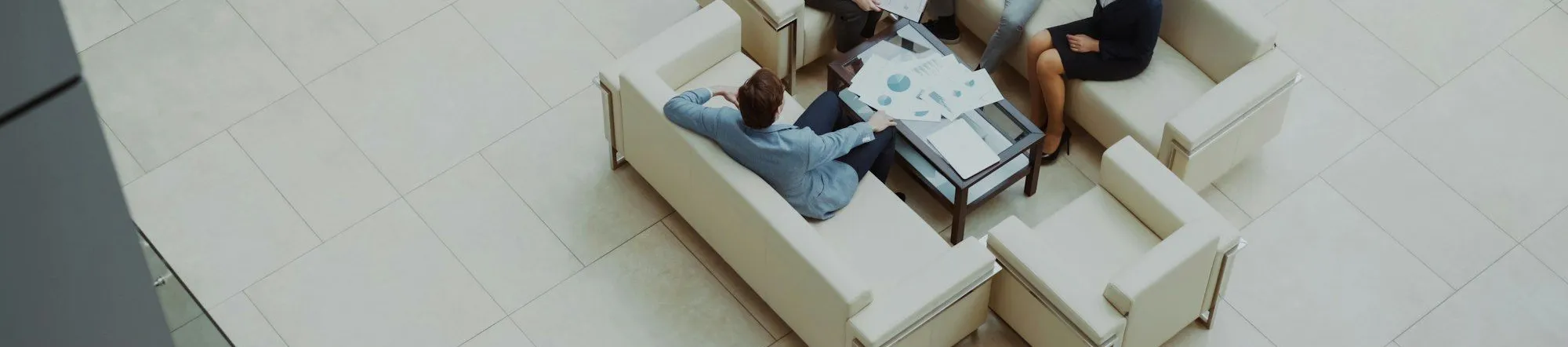 Decision makers evaluating a logistics marketing agency in a meeting